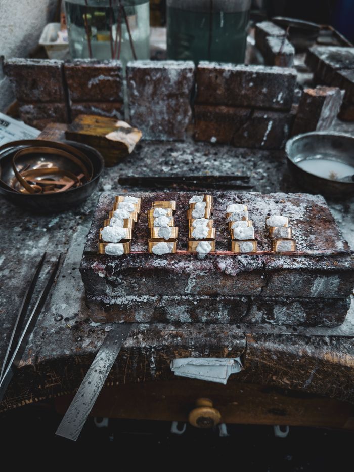 Mastering the First Impression: Your intriguing post title goes here Discover the intricate craft of jewelry making at an artisan workshop in İstanbul, Türkiye, showcasing hand tools and materials.